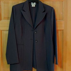 Pretty three-piece business suit (jacket, pants and skirt).